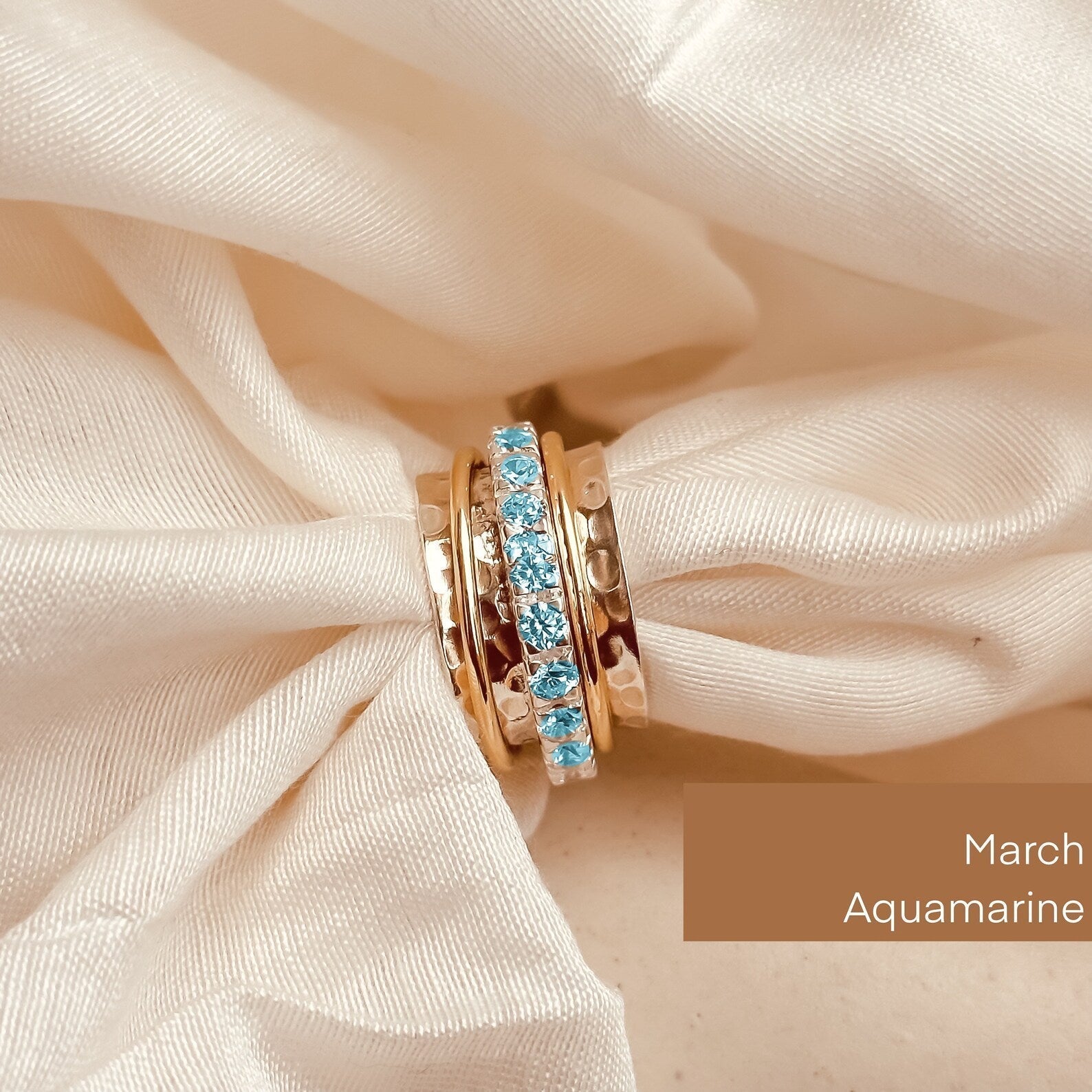 May Birthstone Eternity Spinner Ring - Octonov 